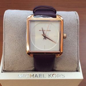 Michael Kors rose gold watch with plum strap